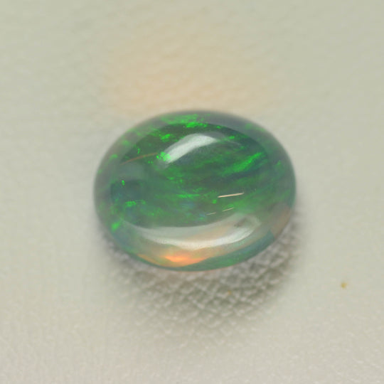 2.44ct Non-Resin Brown Opal with Green Fire Oval Cabochon 10x8 mm Lab Created