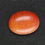 10.04ct Synthetic Red Opal with Green Fire Oval Cabochon 20x15 mm Lab Created