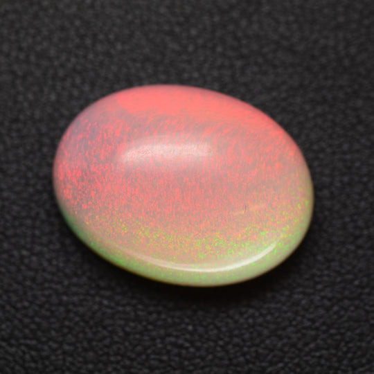 13.02ct Synthetic Pink Opal with Orange Fire Oval Cabochon 20x15 Lab Created
