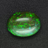 6.92ct Synthetic Black Opal with Green Fire Oval Cabochon 16x12 mm Lab Created