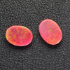 1.39ct 2pcs Set Synthetic Red Opal with Green Fire Oval Cabochon Lab Created