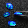0.83ct 4pcs Set Synthetic Blue Opal with Green Fire Oval Cabochon Lab Created