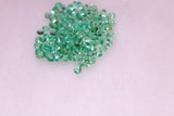 4.1ct RD 1mm Set 1000pc Recrystallized Hydrothermal Zambian Emerald Lab Created